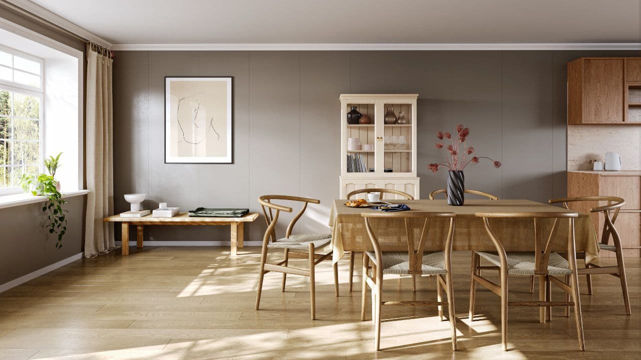 Huntonit veggplater i åpen stue-kjøkken-løsning med eikemøbler.