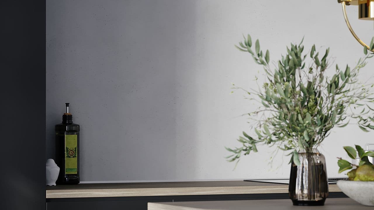 Kjøkken med veggplater i sementdesign.